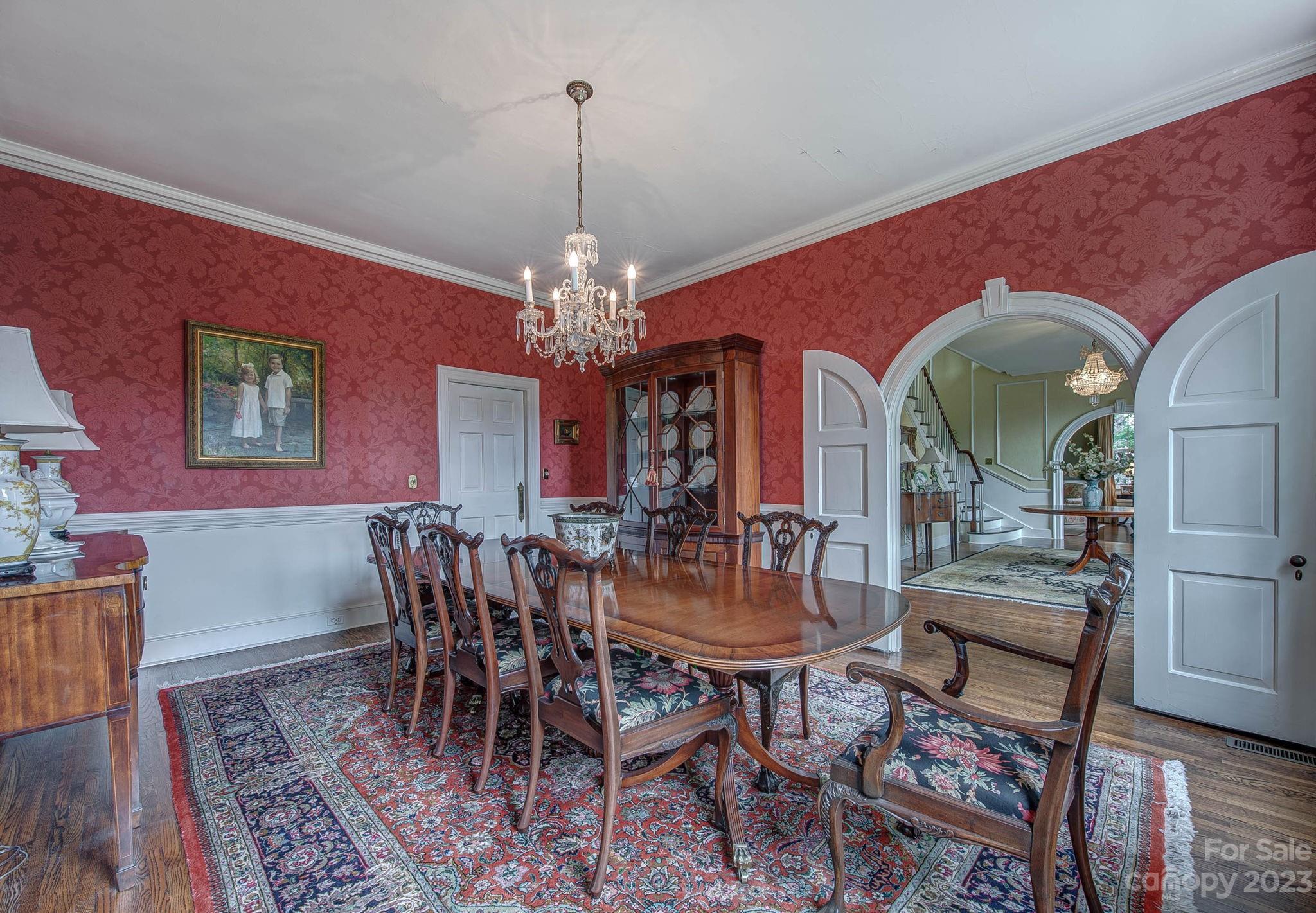104 East Ridge Street Kings Mountain, NC 28086 - Photo 12 of 48 a view of a dining room with furniture and chandelier