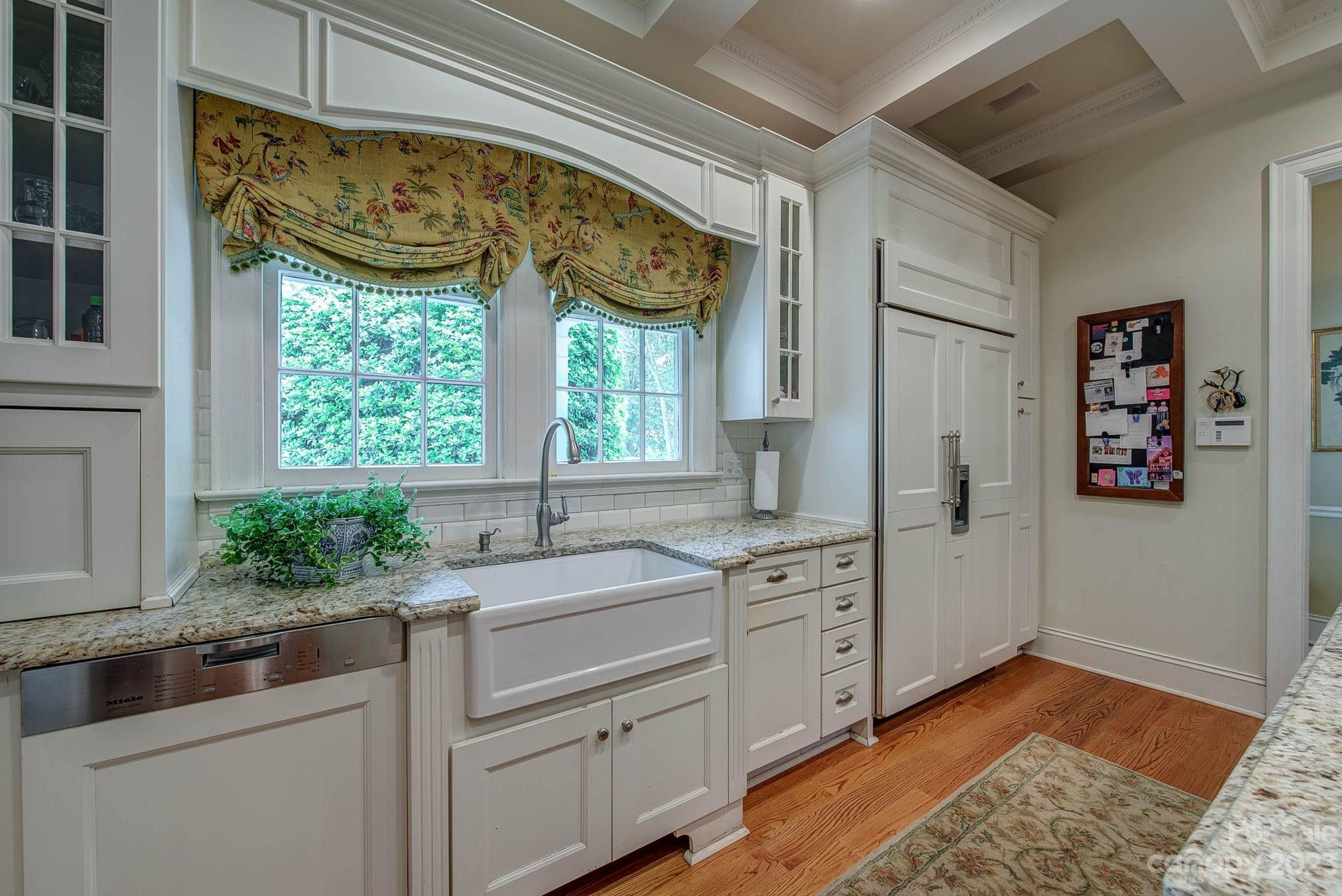 104 East Ridge Street Kings Mountain, NC 28086 - Photo 15 of 48 a kitchen with a stove a sink and a window