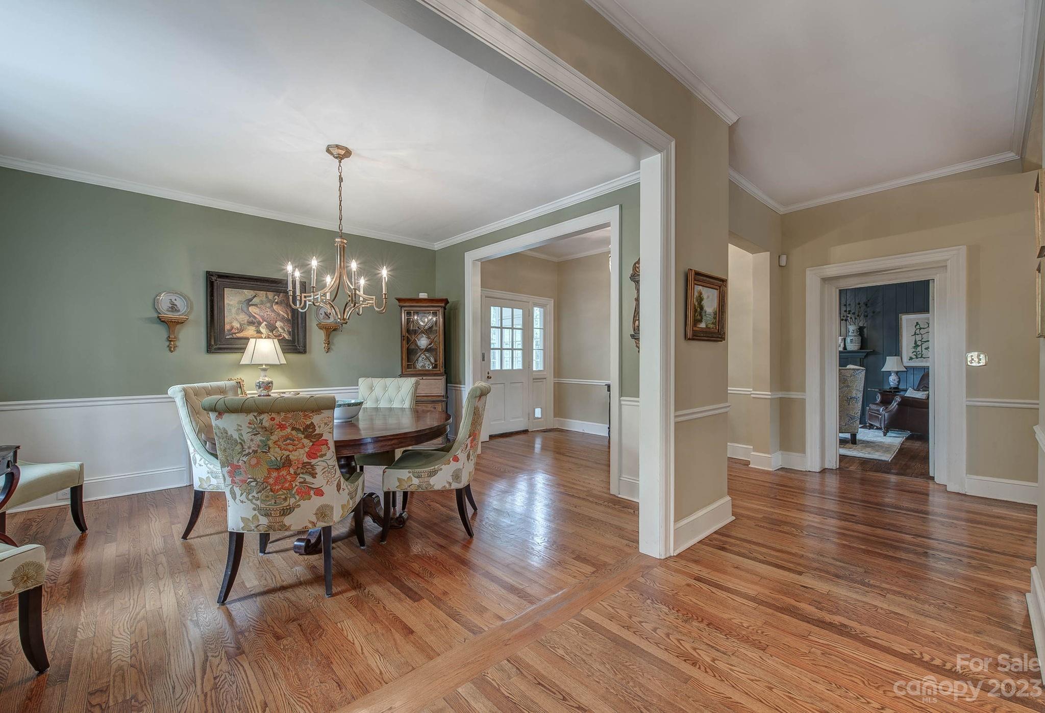 104 East Ridge Street Kings Mountain, NC 28086 - Photo 21 of 48 a view of a dining room with furniture wooden floor and chandelier