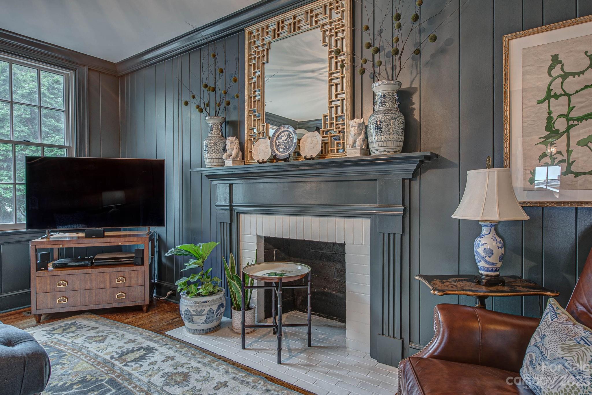 104 East Ridge Street Kings Mountain, NC 28086 - Photo 23 of 48 a living room with furniture and a fireplace