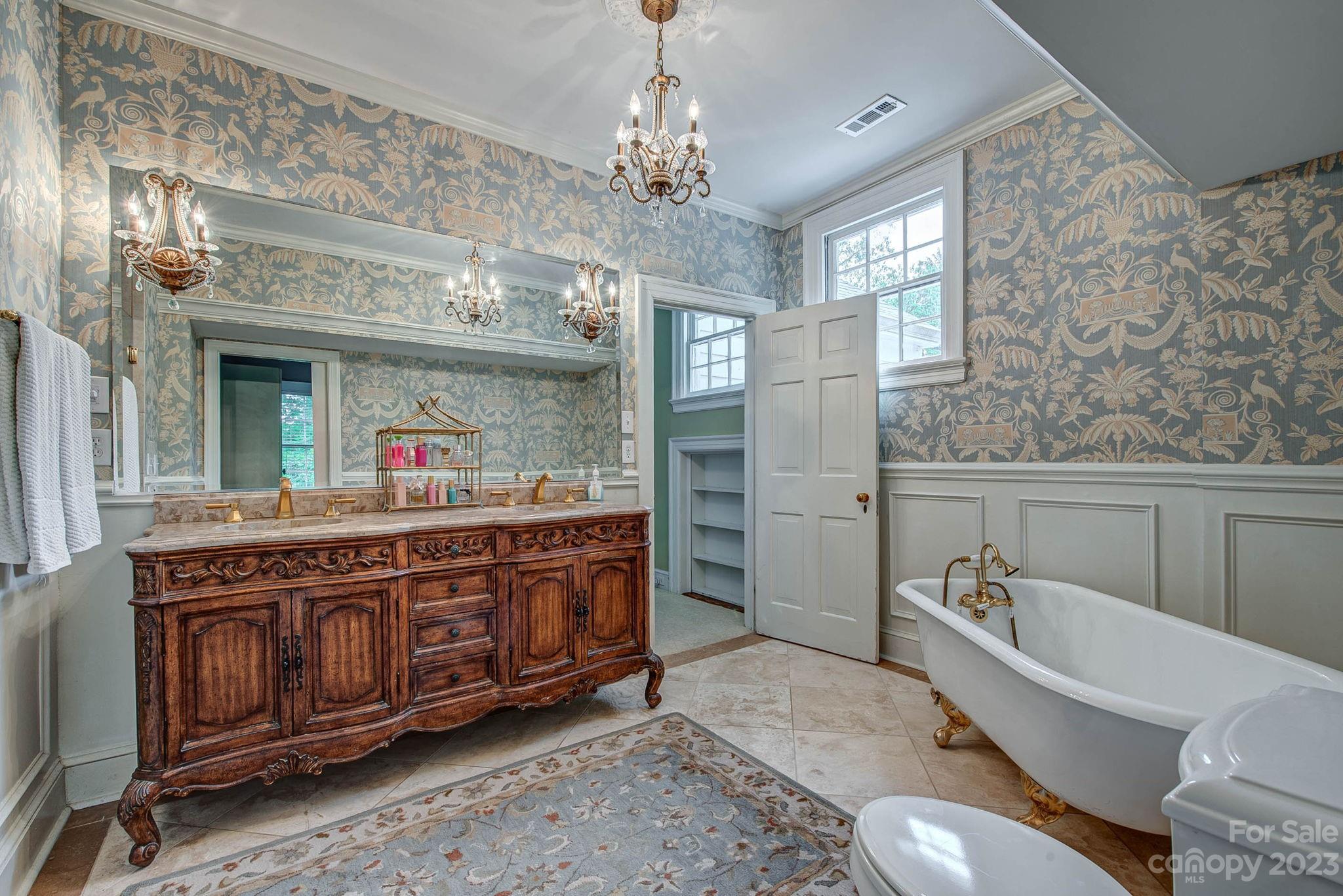 104 East Ridge Street Kings Mountain, NC 28086 - Photo 29 of 48 a spacious bathroom with a granite countertop tub sink and mirror