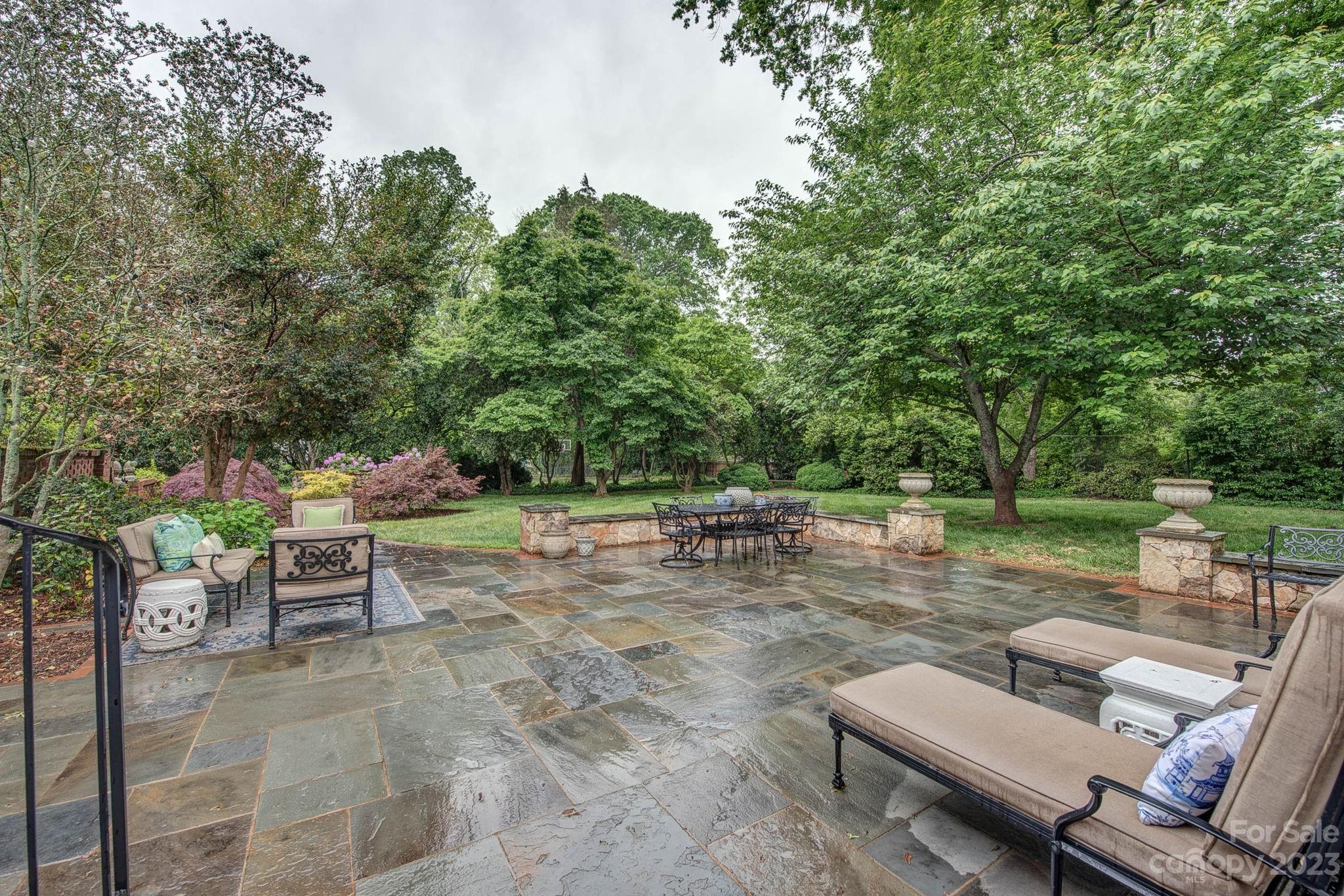 104 East Ridge Street Kings Mountain, NC 28086 - Photo 44 of 48 a view of a patio with chairs and a table