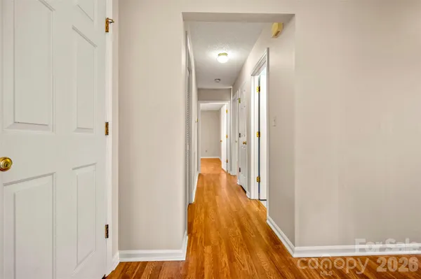a view of a livingroom from a hallway