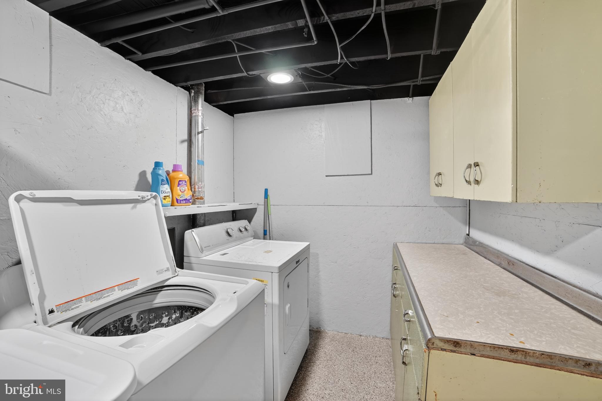 305 Irish Road Berwyn, PA 19312 - Photo 29 of 34 a utility room with dryer and washer