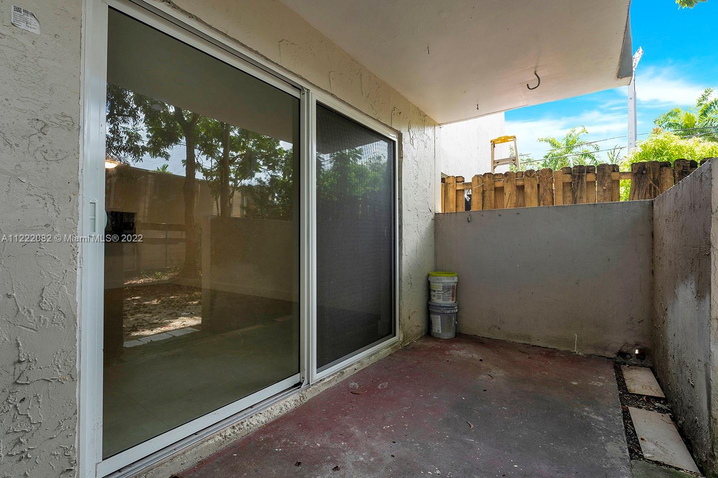 6904 North Kendall Drive, Unit F102 Pinecrest, FL 33156 - Photo 15 of 19 a view of a hallway