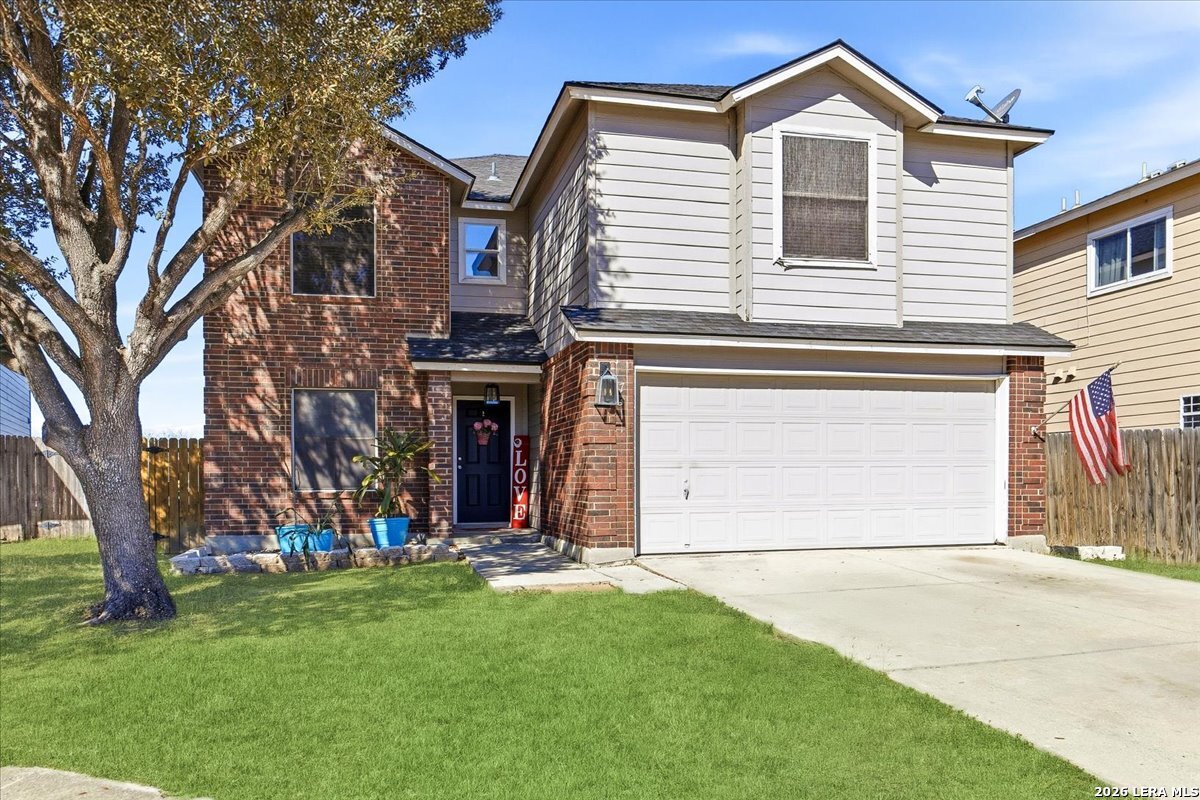 7311 Autumn Ledge Converse, TX 78109 - Photo 1 of 25 a front view of a house with a yard