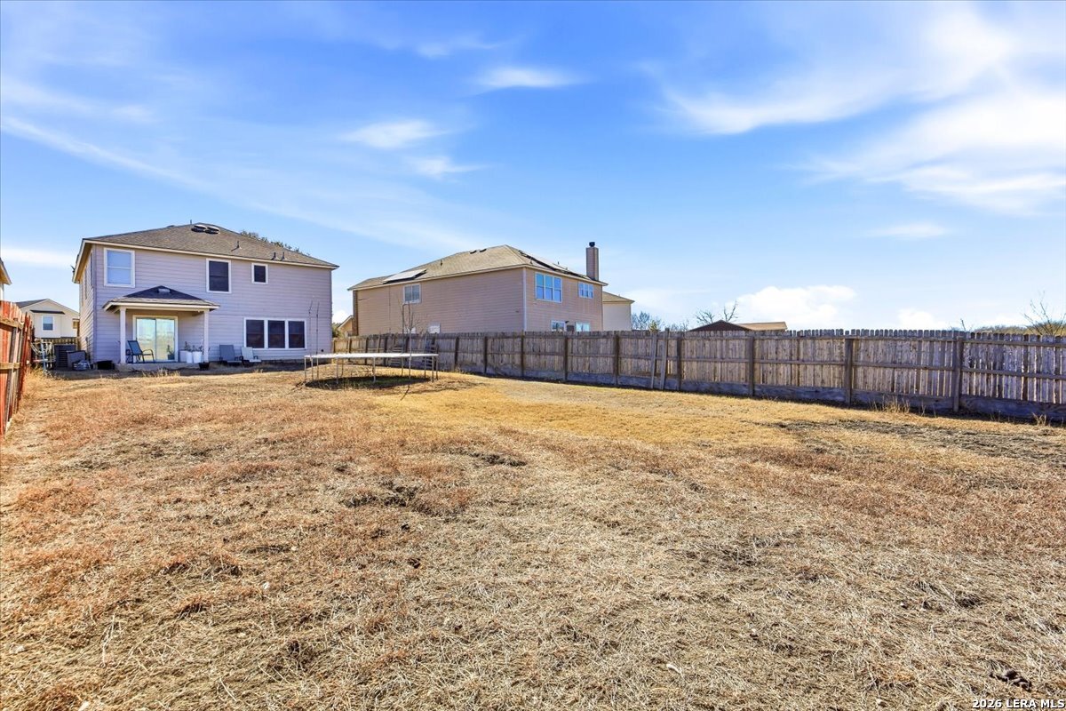 7311 Autumn Ledge Converse, TX 78109 - Photo 24 of 25 a view of a house with a yard