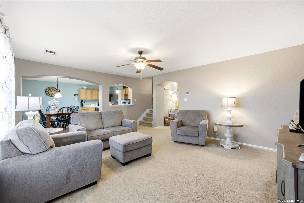 7311 Autumn Ledge Converse, TX 78109 - Photo 3 of 25 a living room with furniture and a lamp