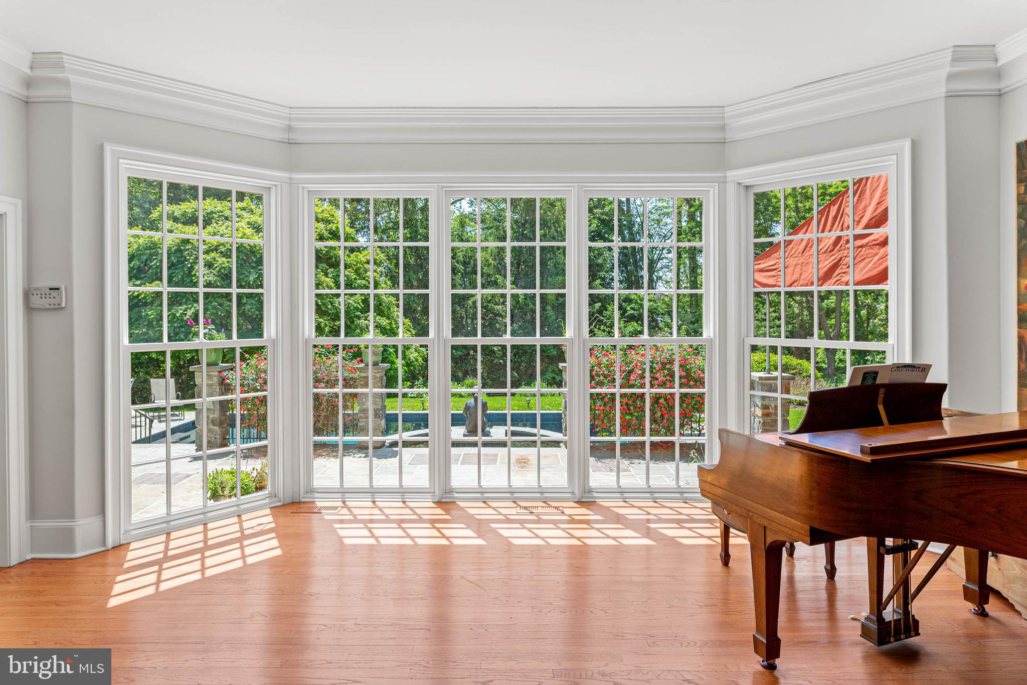 737 Eagle Farm Road Villanova, PA 19085 - Photo 5 of 20 Floor-to-ceiling glass in the living room