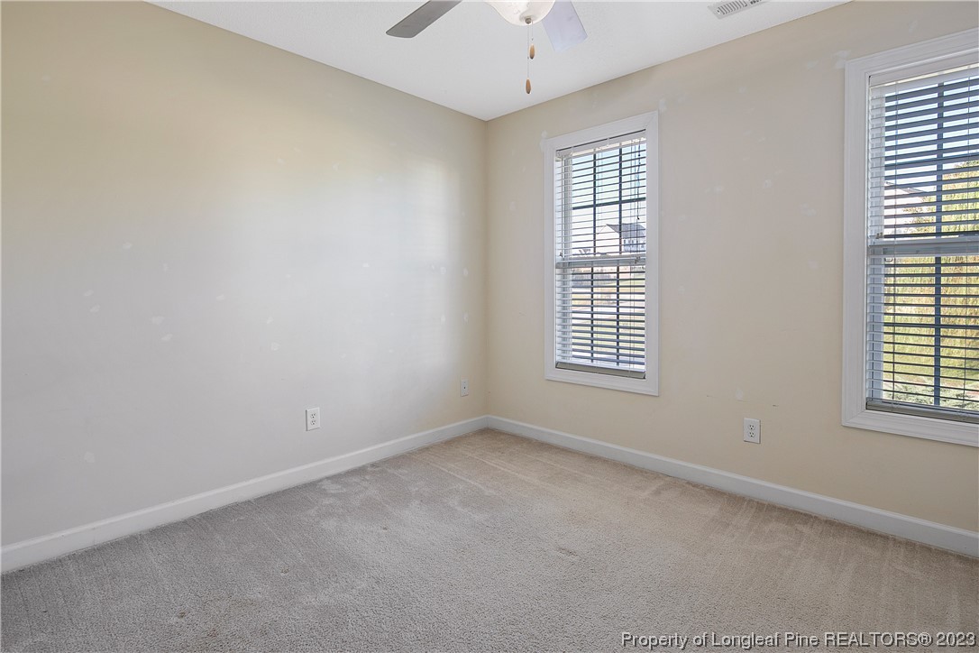 136 Linden Road Cameron, NC 28326 - Photo 39 of 48 an empty room with windows