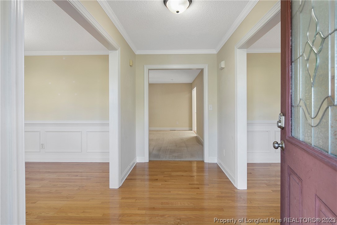 136 Linden Road Cameron, NC 28326 - Photo 4 of 48 a view of a bathroom from the hallway