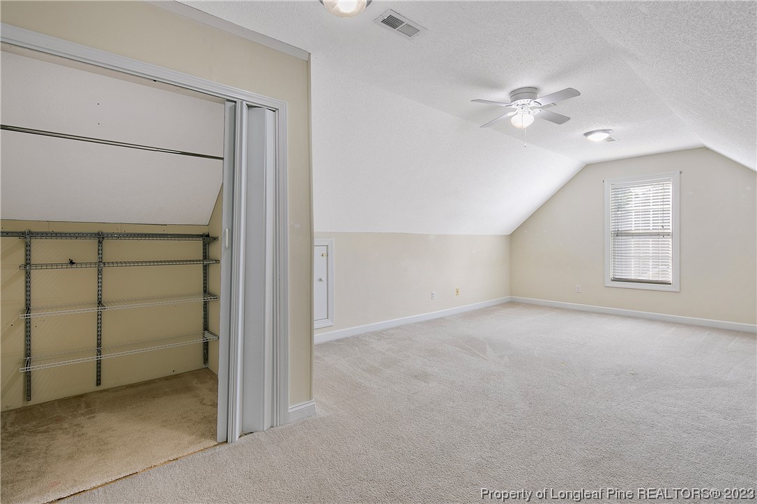 136 Linden Road Cameron, NC 28326 - Photo 42 of 48 an empty room with windows and closet