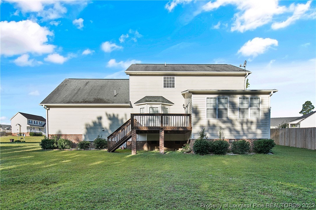 136 Linden Road Cameron, NC 28326 - Photo 45 of 48 a front view of a house with a garden