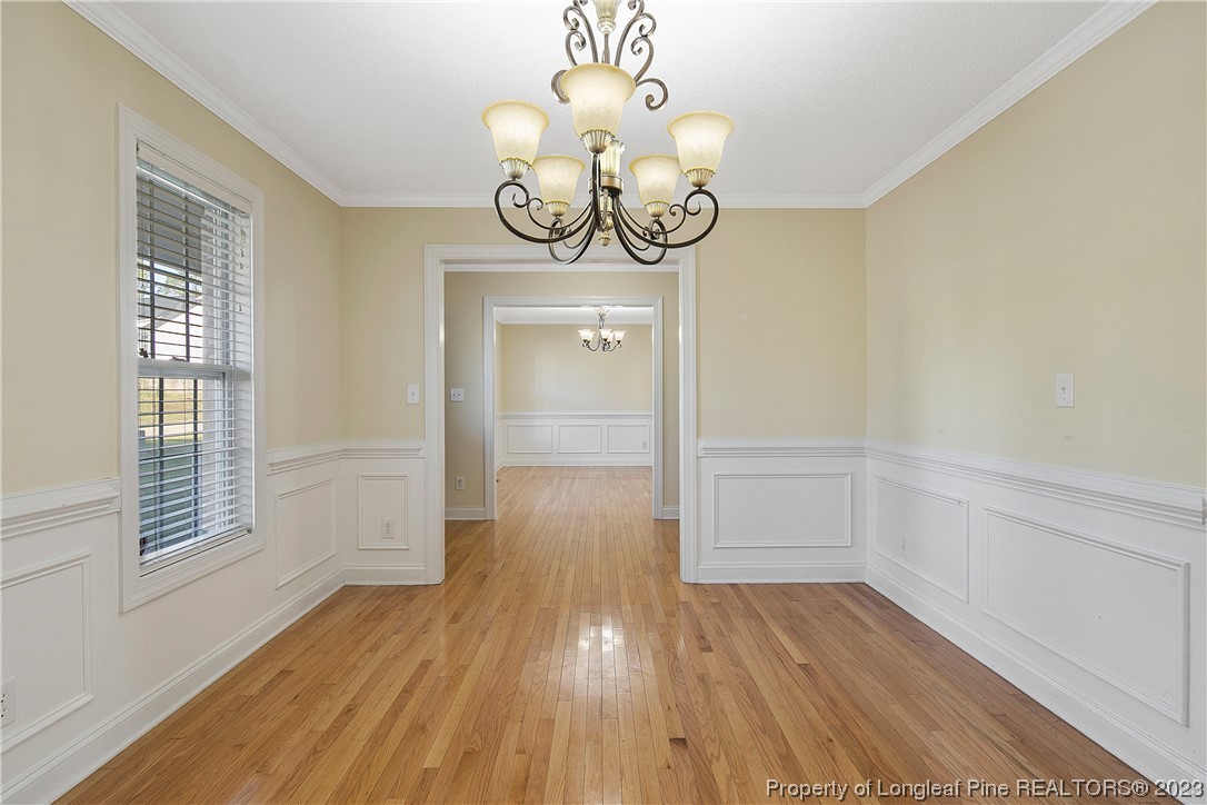 136 Linden Road Cameron, NC 28326 - Photo 8 of 48 a view of room with wooden floor