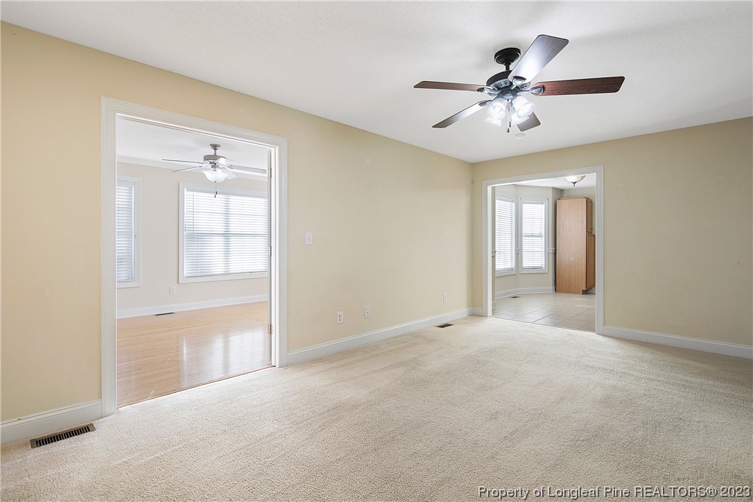 136 Linden Road Cameron, NC 28326 - Photo 10 of 48 a view of an empty room with a window