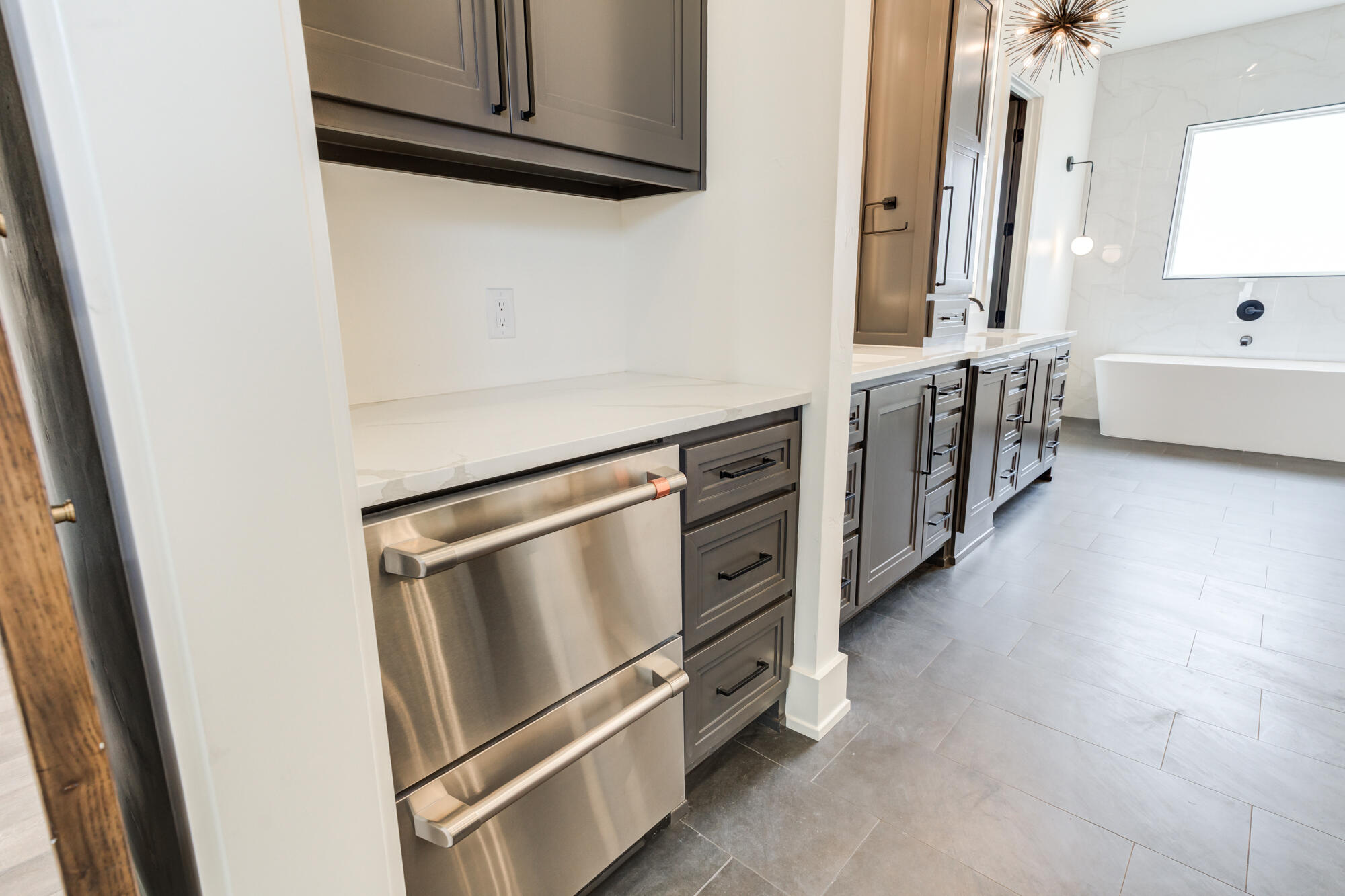 7710 46th Street Lubbock, TX 79407 - Photo 38 of 79 a kitchen with stainless steel appliances a stove and a microwave