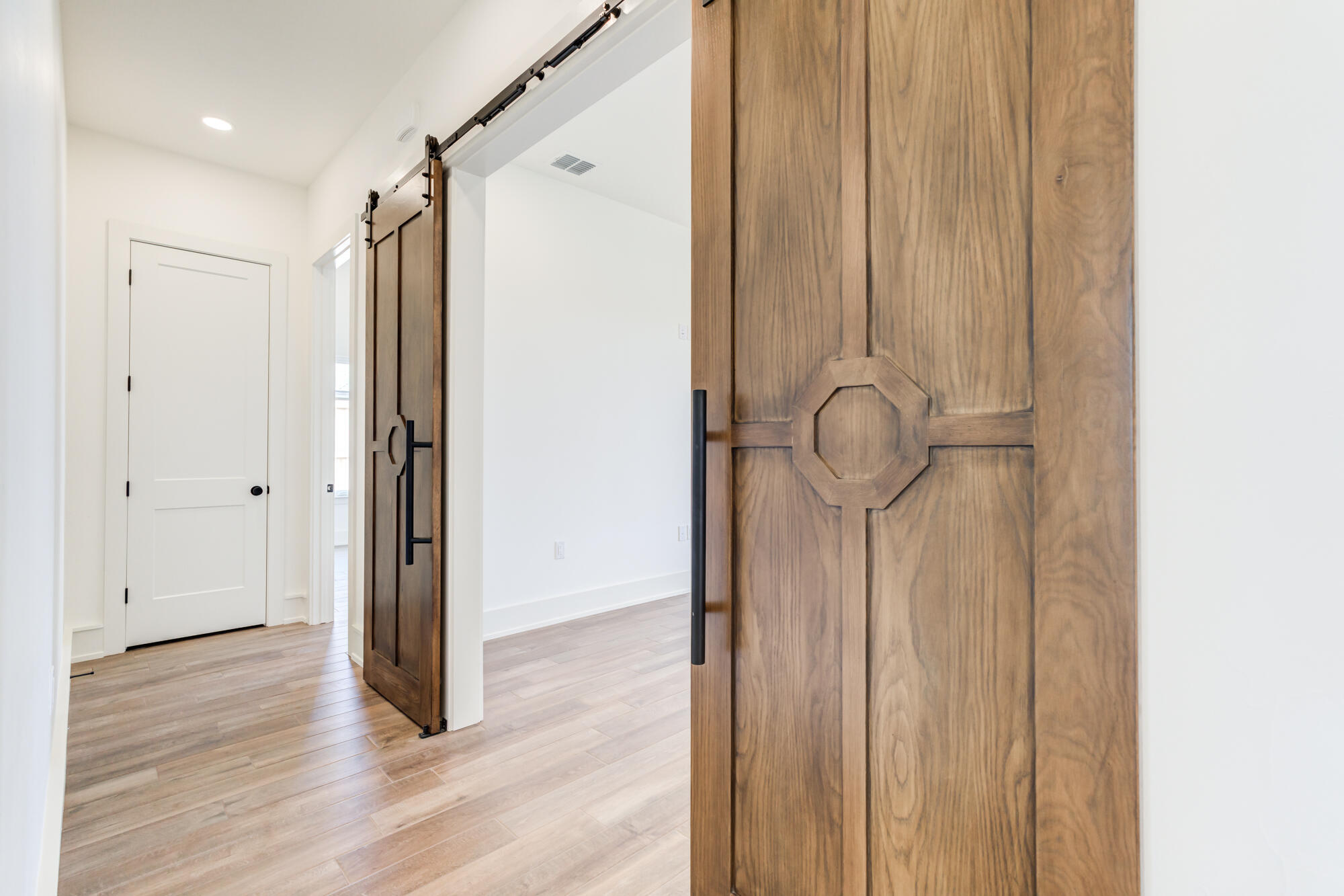 7710 46th Street Lubbock, TX 79407 - Photo 60 of 79 a view of a room with wooden floor and interior