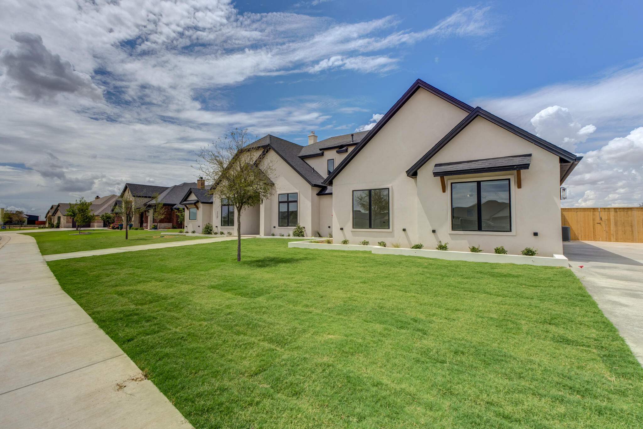7710 46th Street Lubbock, TX 79407 - Photo 10 of 79 a front view of house with yard and green space