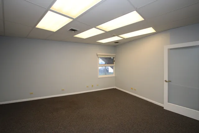 an empty room with a natural light