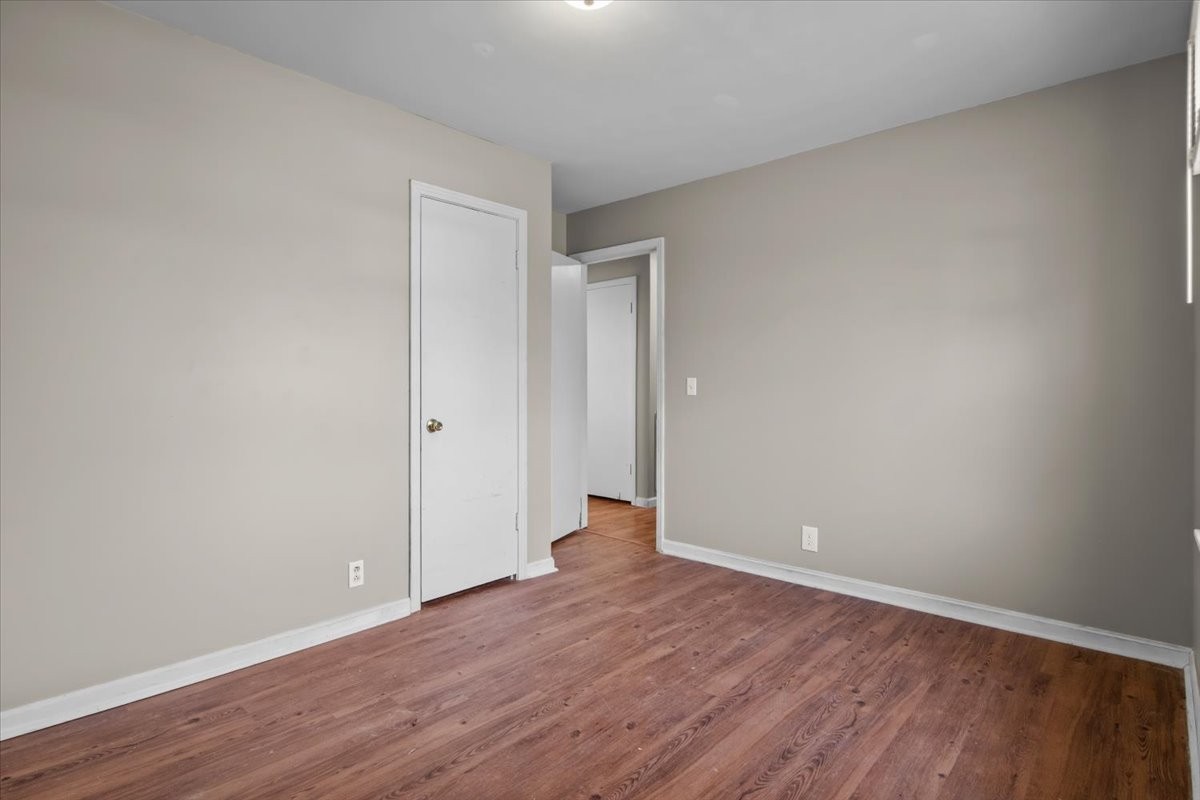 105 Mae Circle Dickson, TN 37055 - Photo 15 of 26 a view of an empty room with wooden floor