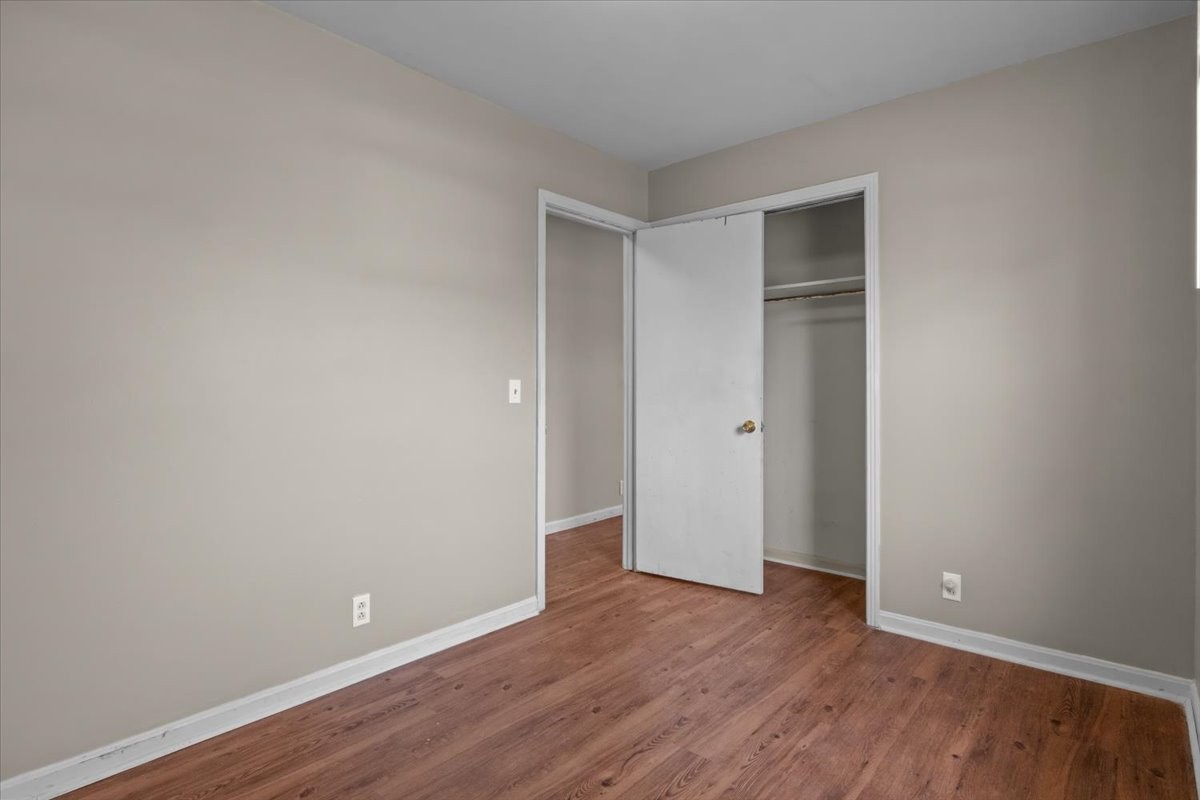 105 Mae Circle Dickson, TN 37055 - Photo 17 of 26 a view of an empty room with wooden floor and closet