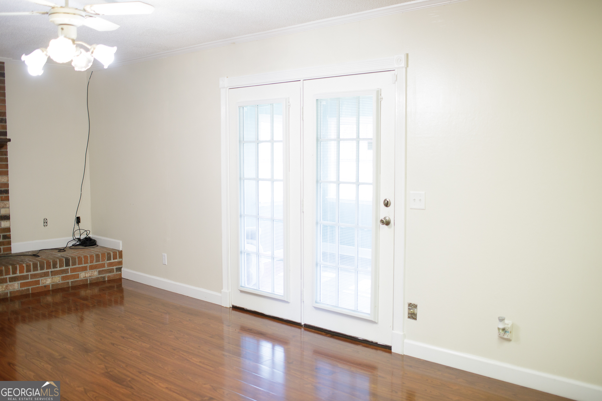 2110 Ware Street Blackshear, GA 31516 - Photo 31 of 57 a view of room with hardwood floor and window