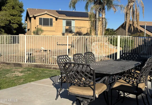 a view of balcony with furniture