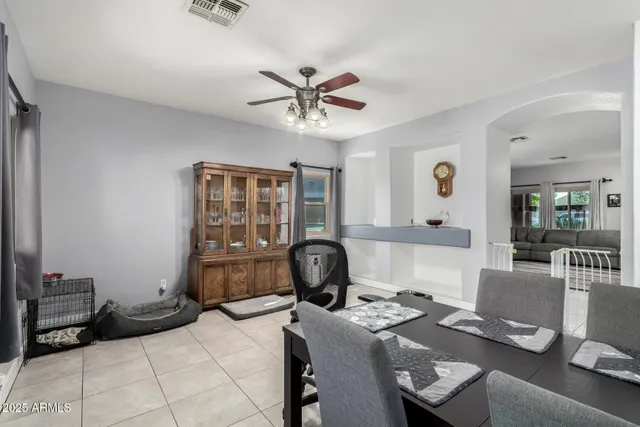 a kitchen with stainless steel appliances a sink stove and refrigerator