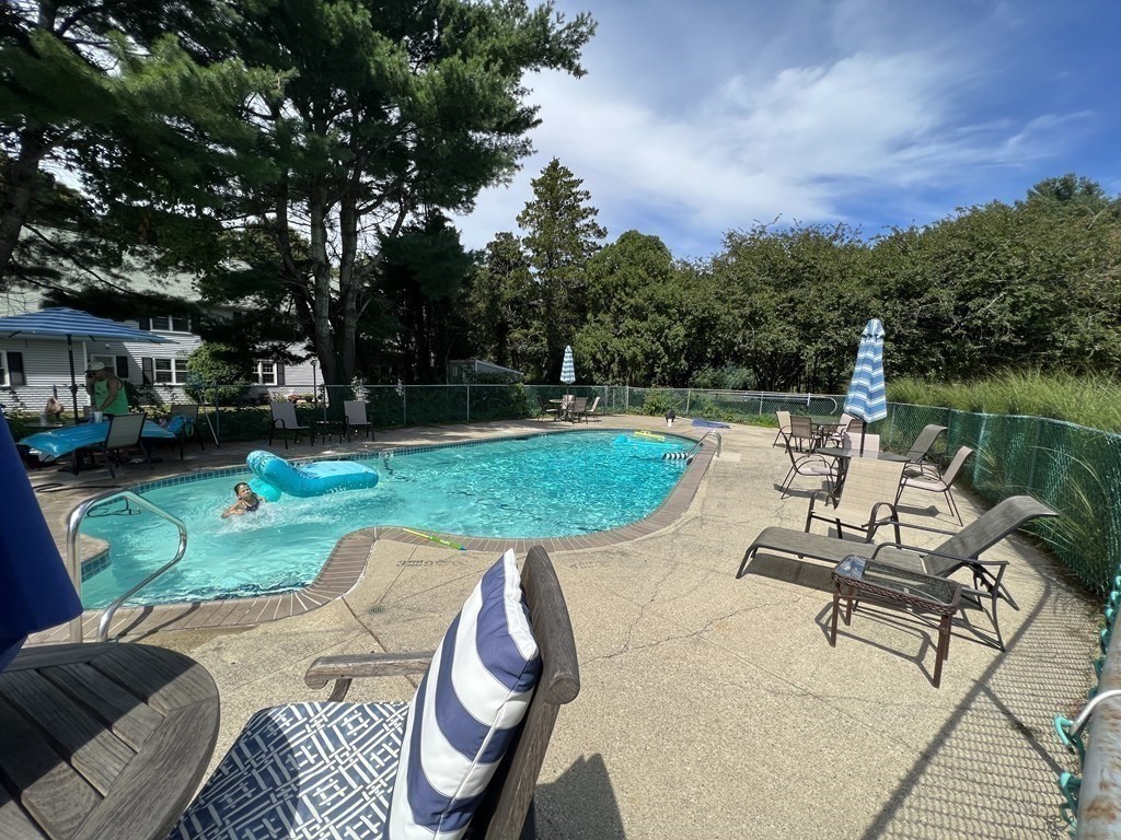 12 State Road, Unit 2E Plymouth, MA 02360 - Photo 25 of 28 a view of a backyard with sitting area