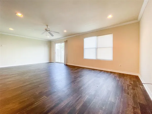 a picture of a bench in front of a wall