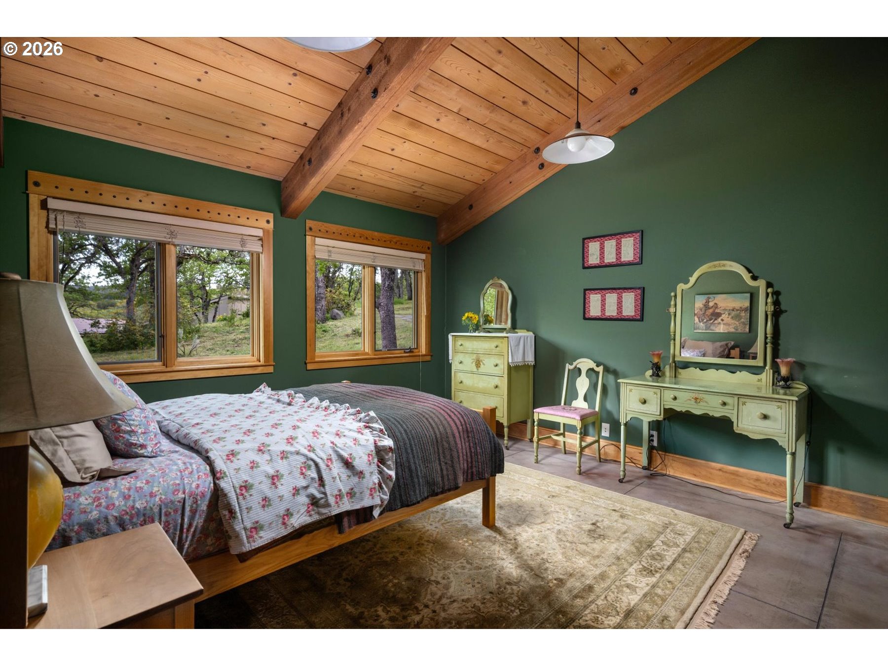 1945 Cynthia Way Mosier, OR 97040 - Photo 26 of 48 a bedroom with a bed window with table and chair