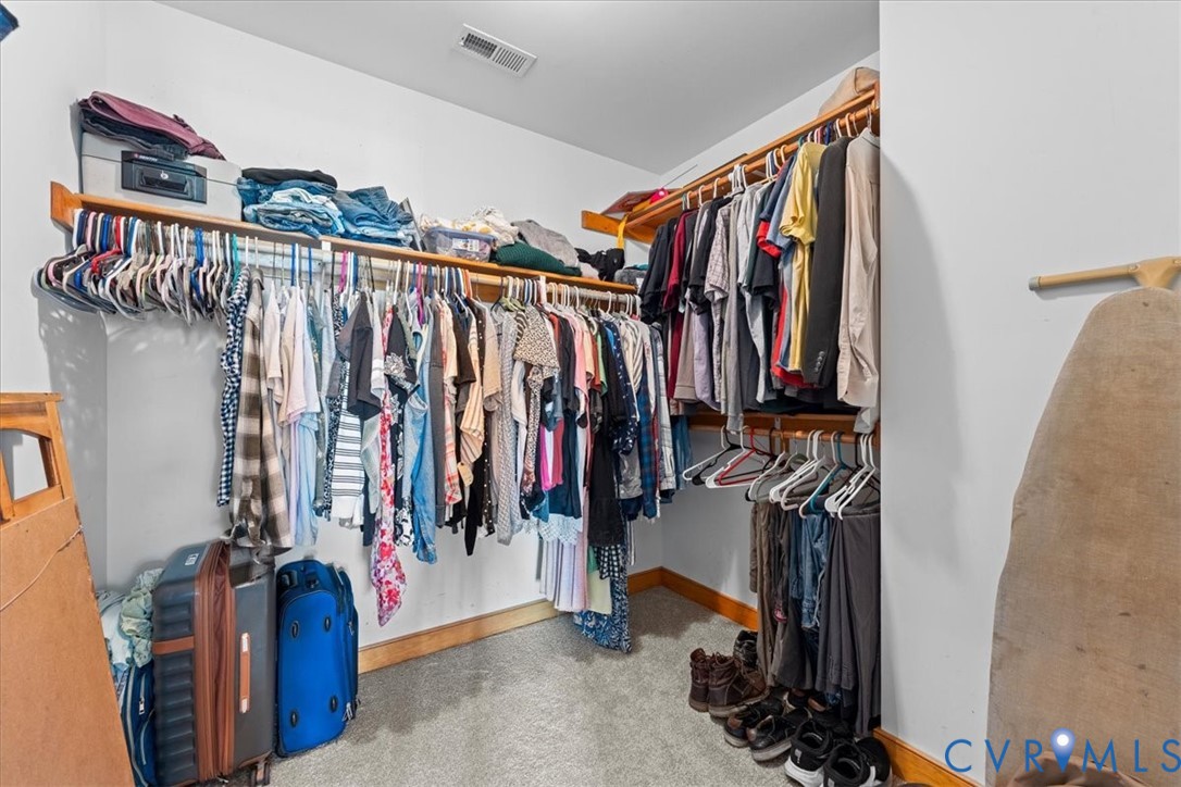 3137 Trenholm Road Powhatan, VA 23139 - Photo 34 of 72 a view of walk in closet with clothes