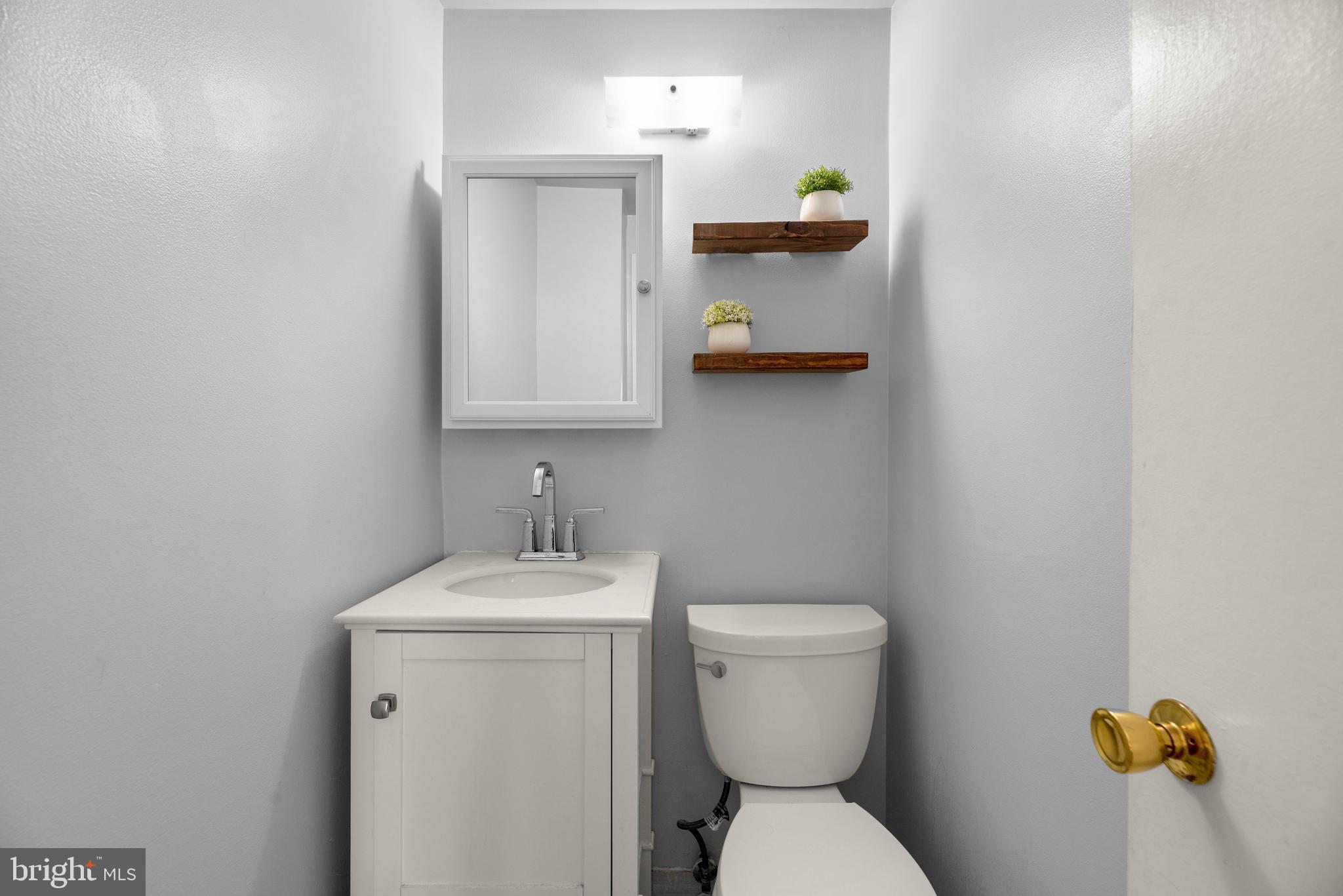 906 Grovehill Road Halethorpe, MD 21227 - Photo 17 of 37 Primary Half Bath