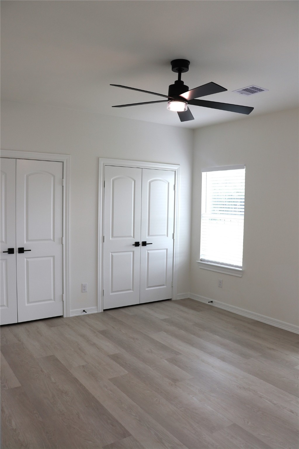 16602 Bonnie Sean Drive Spring, TX 77379 - Photo 11 of 14 a view of an empty room with a window