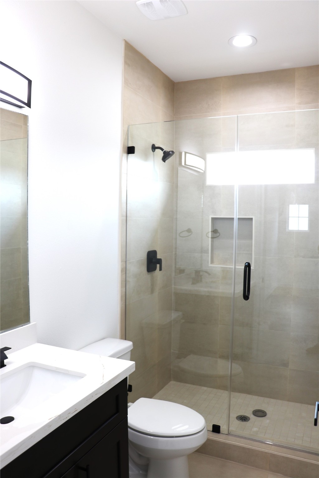 16602 Bonnie Sean Drive Spring, TX 77379 - Photo 12 of 14 a bathroom with a sink a toilet and shower