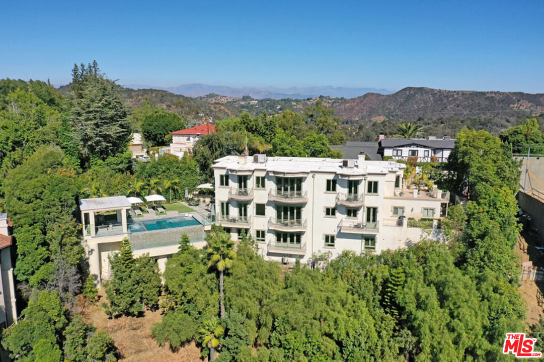 1861 Bel Air Road Los Angeles, CA 90077 - Photo 2 of 44 an aerial view of a building with a garden