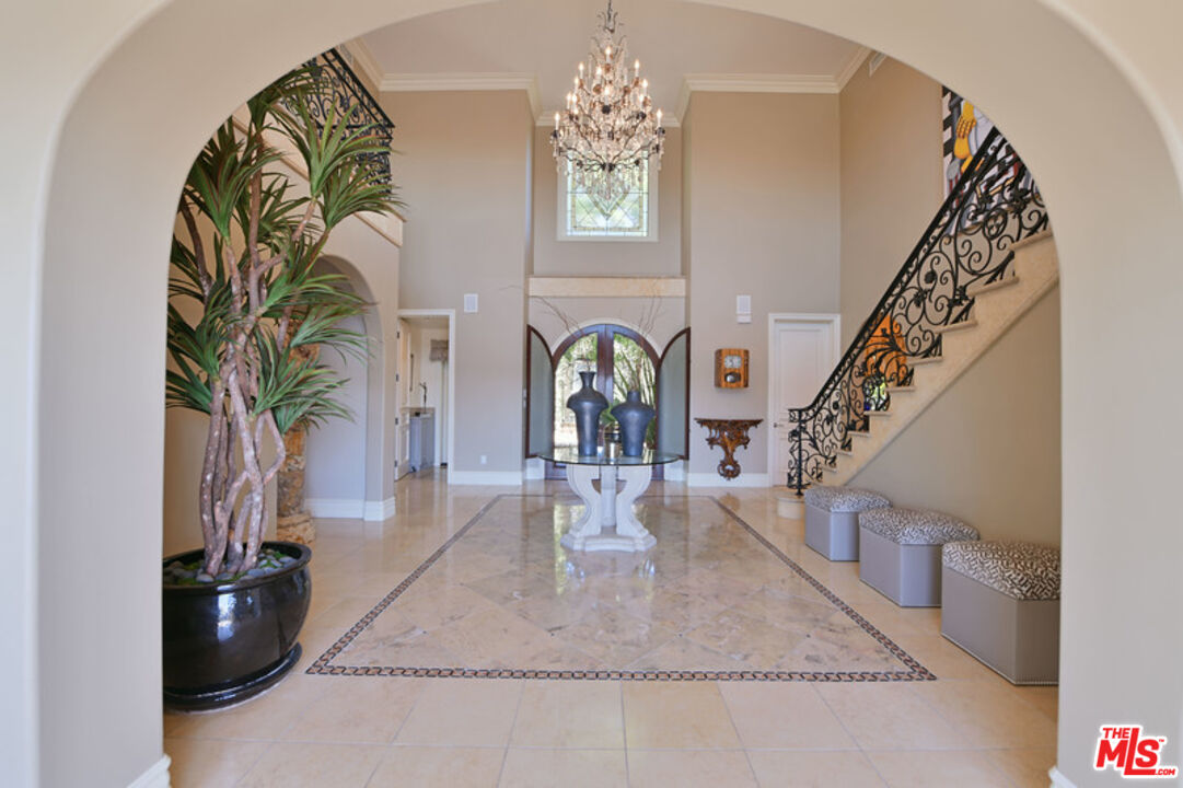 1861 Bel Air Road Los Angeles, CA 90077 - Photo 27 of 44 a view of entryway and hall with wooden floor