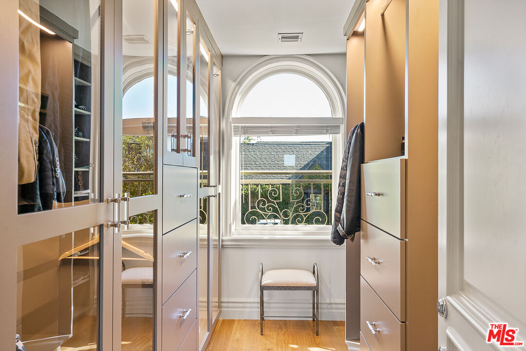 1861 Bel Air Road Los Angeles, CA 90077 - Photo 33 of 44 a view of a fireplace with a swimming pool