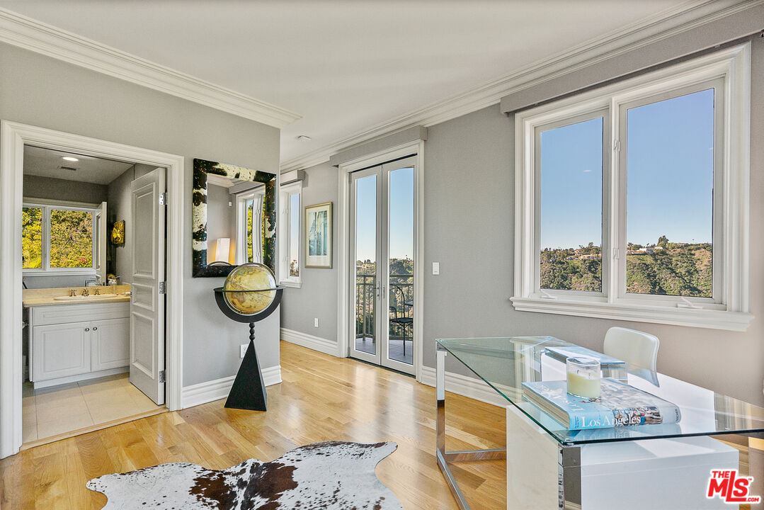 1861 Bel Air Road Los Angeles, CA 90077 - Photo 37 of 44 a living room with a couch
