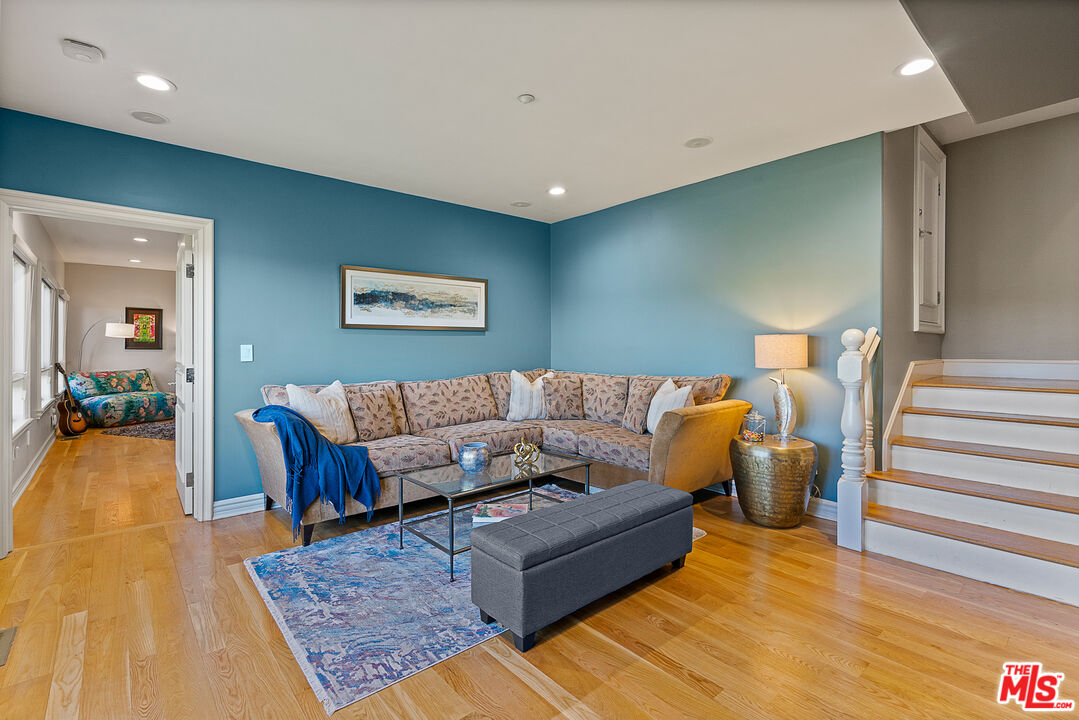 1861 Bel Air Road Los Angeles, CA 90077 - Photo 39 of 44 a living room with furniture and a rug