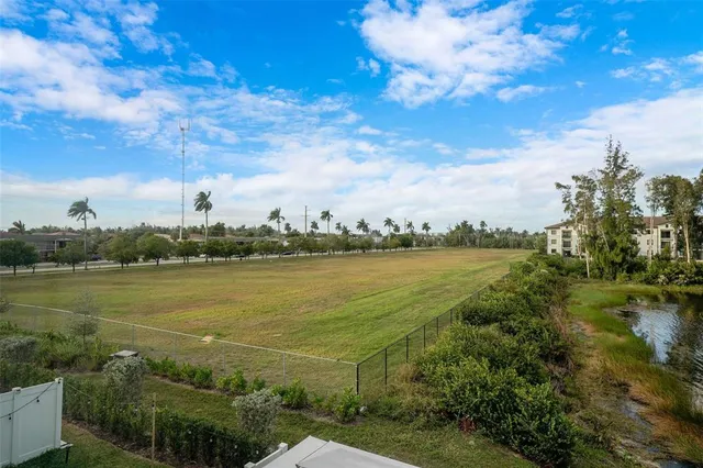 a view of an ocean with boats