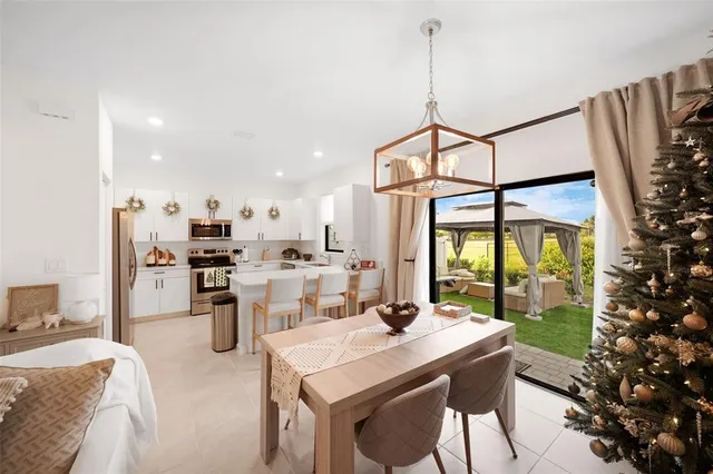 a view of a dining room with furniture