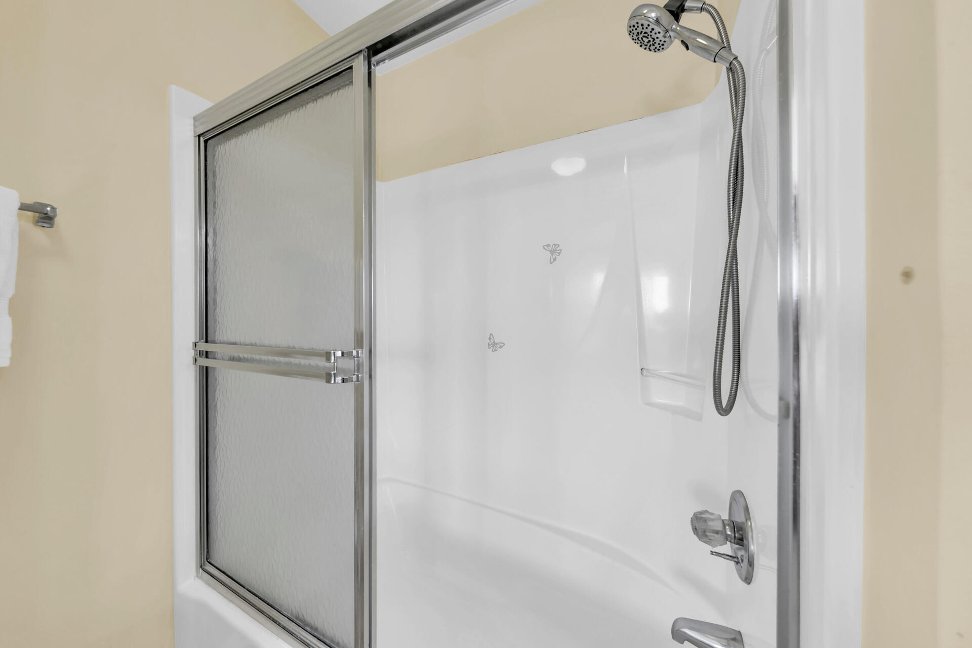 60 Sandprints Drive, Unit C4 Miramar Beach, FL 32550 - Photo 12 of 28 a bathroom with a glass shower door