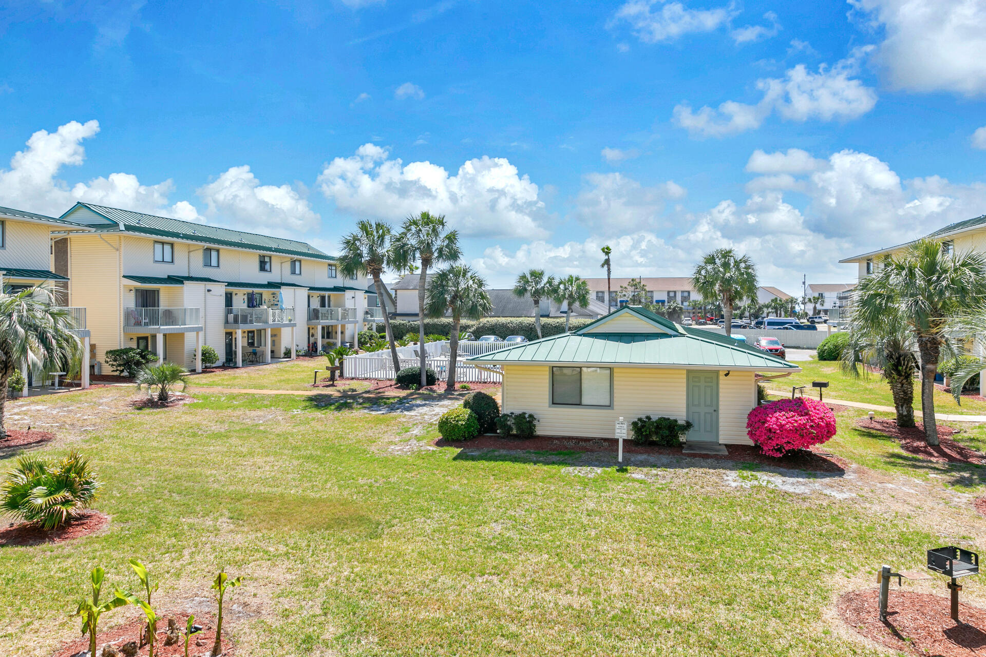 60 Sandprints Drive, Unit C4 Miramar Beach, FL 32550 - Photo 16 of 28 a swimming pool with outdoor seating and yard