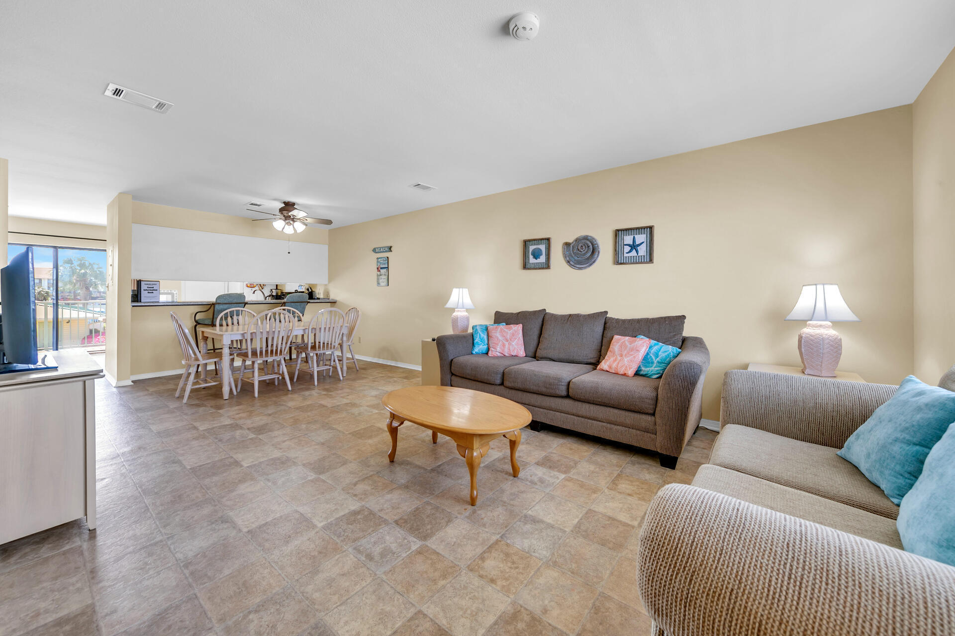 60 Sandprints Drive, Unit C4 Miramar Beach, FL 32550 - Photo 2 of 28 a living room with furniture and a table