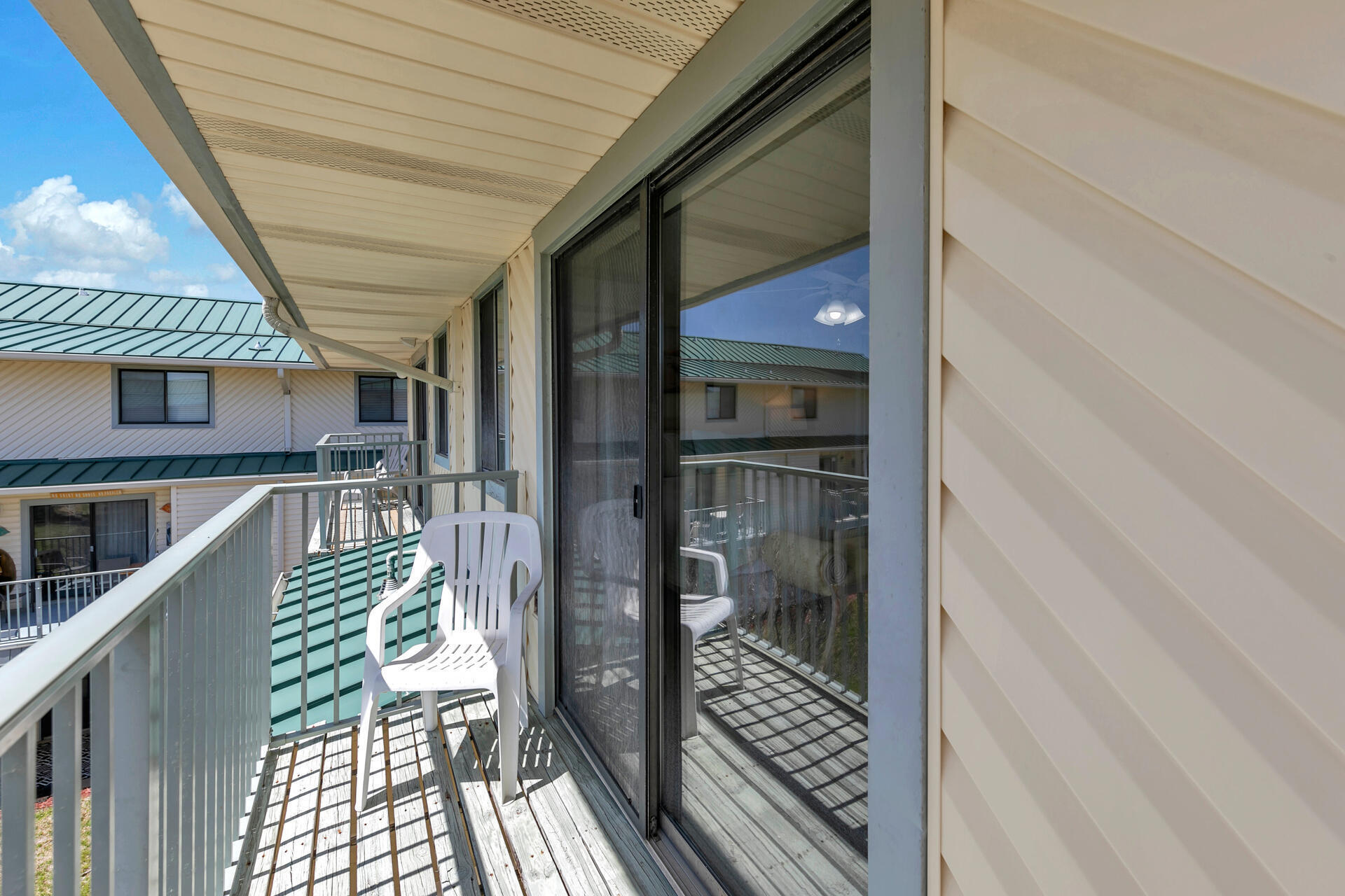 60 Sandprints Drive, Unit C4 Miramar Beach, FL 32550 - Photo 21 of 28 a balcony view with a glass door shower