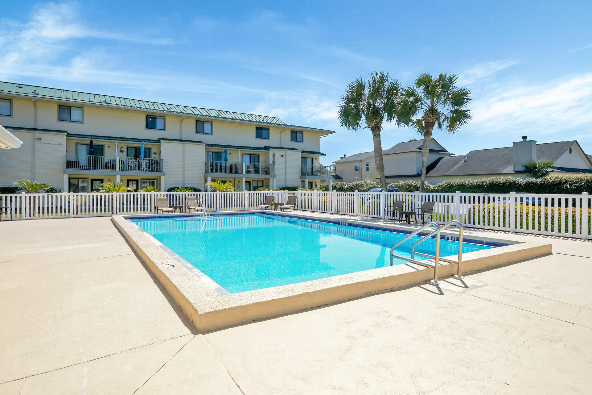 60 Sandprints Drive, Unit C4 Miramar Beach, FL 32550 - Photo 23 of 28 a view of a patio with swimming pool table and chairs
