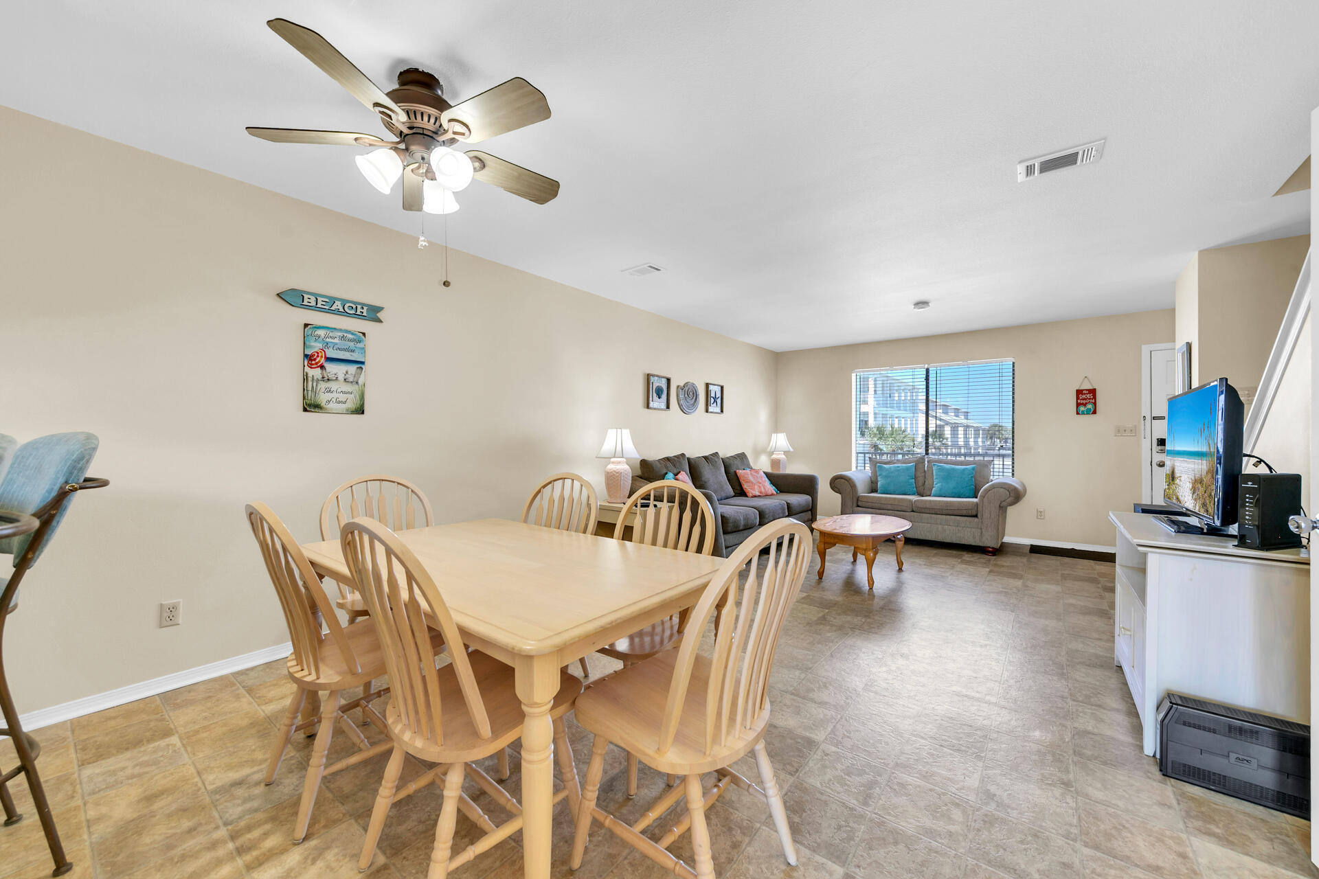 60 Sandprints Drive, Unit C4 Miramar Beach, FL 32550 - Photo 5 of 28 a view of a dining room with furniture and a chandelier