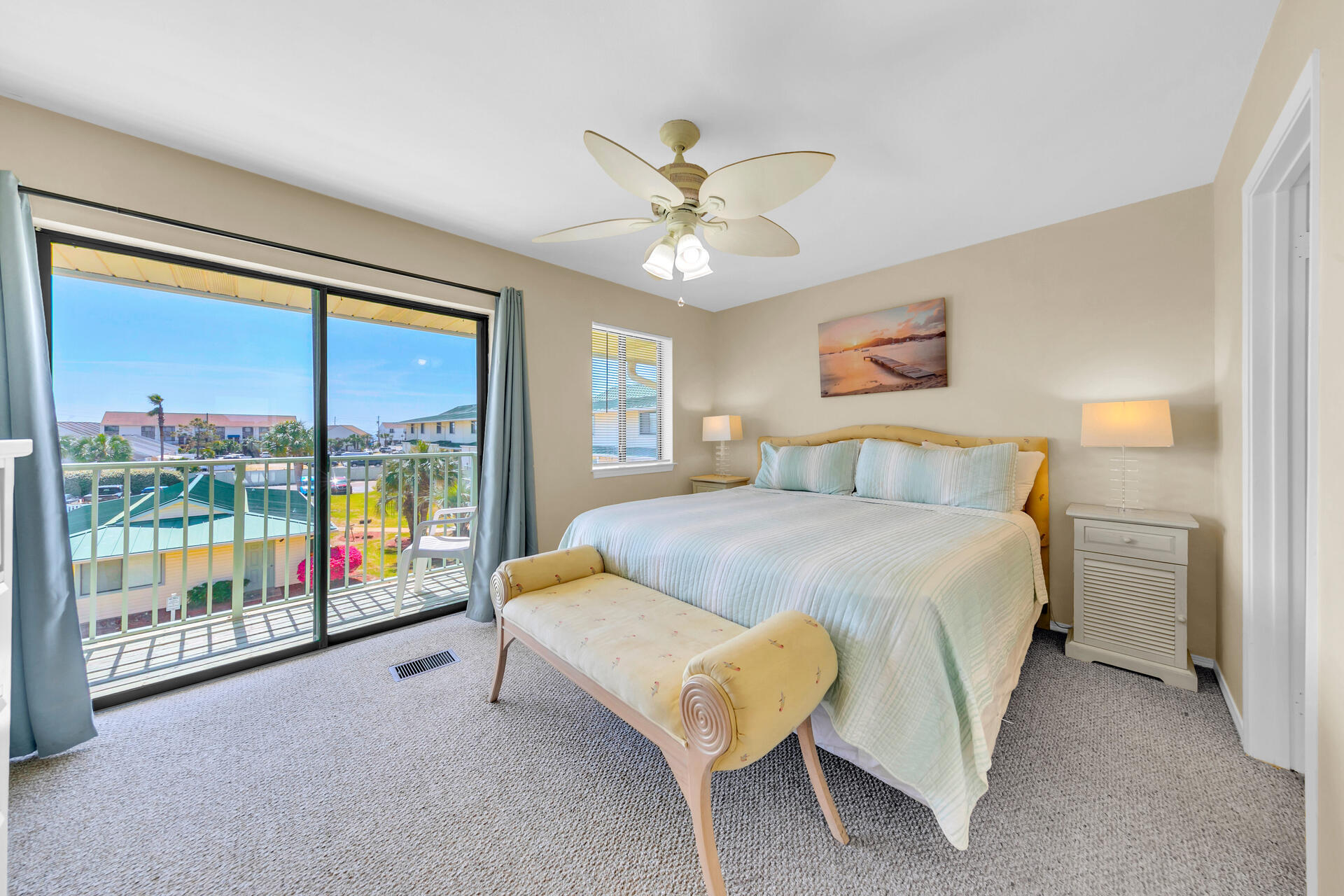 60 Sandprints Drive, Unit C4 Miramar Beach, FL 32550 - Photo 8 of 28 a bedroom with a bed and a chandelier