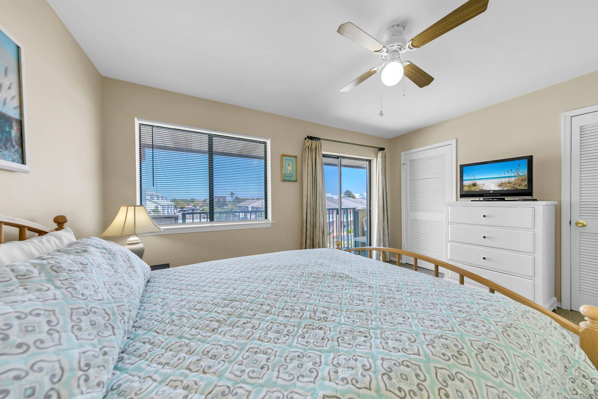 60 Sandprints Drive, Unit C4 Miramar Beach, FL 32550 - Photo 10 of 28 a bedroom with a bed and a flat screen tv